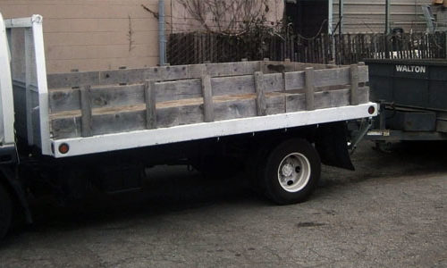 dump trailer attached to a truck at a construction site