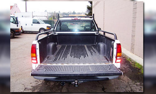 Pickup truck driving on a rural road