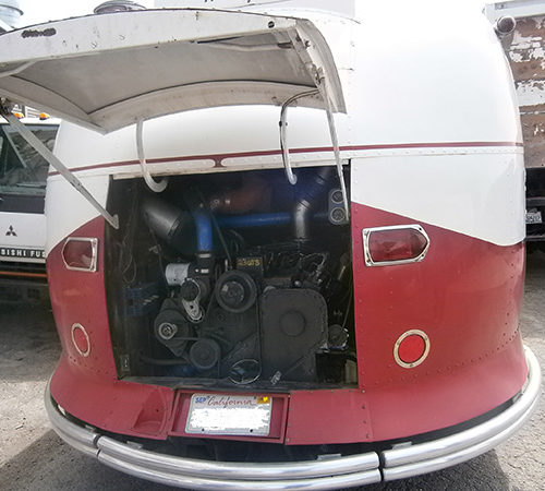 Checking truck engine during inspection